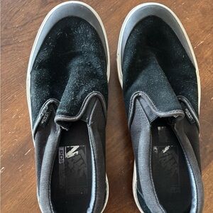 Vans Black suede slip ons